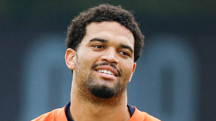 Aug 5, 2026; Lake Forest, IL, USA; Chicago Bears quarterback Caleb Williams (18) stands on the field during training camp at Halas Hall. Mandatory Credit: Kamil Krzaczynski-Imagn Images Aug 5, 2026; Lake Forest, IL, USA; Chicago Bears quarterback Caleb Williams (18) stands on the field during training camp at Halas Hall. Mandatory Credit: Kamil Krzaczynski-Imagn Images