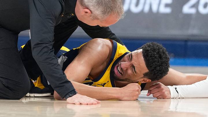 Jun 22, 2025; Oklahoma City, Oklahoma, USA; Indiana Pacers guard Tyrese Haliburton (0) reacts after suffering an injury during the first quarter against the Oklahoma City Thunder during game seven of the 2025 NBA Finals at Paycom Center. Mandatory Credit: Kyle Terada-Imagn Images