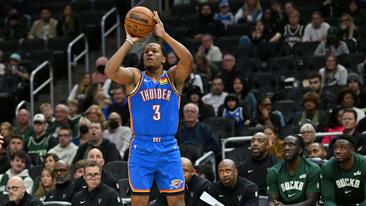 Oct 14, 2025; Milwaukee, Wisconsin, USA; Oklahoma City Thunder guard Chris Youngblood (3) hits a three point shot against the Milwaukee Bucks during the second half at Fiserv Forum. Mandatory Credit: Patrick Gorski-Imagn Images Oct 14, 2025; Milwaukee, Wisconsin, USA; Oklahoma City Thunder guard Chris Youngblood (3) hits a three point shot against the Milwaukee Bucks during the second half at Fiserv Forum. Mandatory Credit: Patrick Gorski-Imagn Images