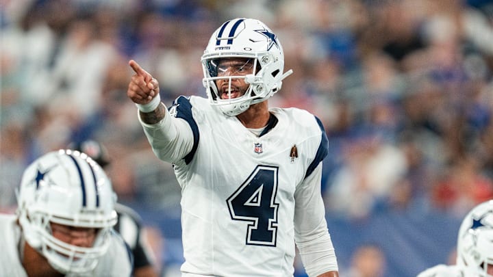 Dallas Cowboys quarterback Dak Prescott (4) calls out the defense prior to the snap of the ball at MetLife Stadium. Dallas Cowboys quarterback Dak Prescott (4) calls out the defense prior to the snap of the ball at MetLife Stadium.