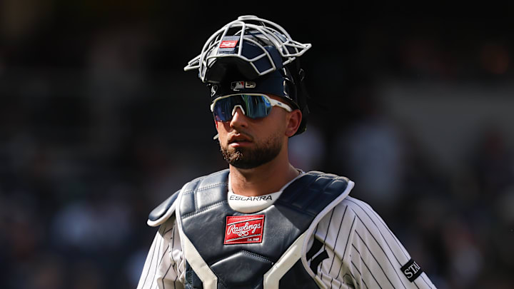 Jun 29, 2025; Bronx, New York, USA; New York Yankees catcher J.C. Escarra (25) walks off the field after the top of the eighth inning against the Athletics at Yankee Stadium. Mandatory Credit: Vincent Carchietta-Imagn Images