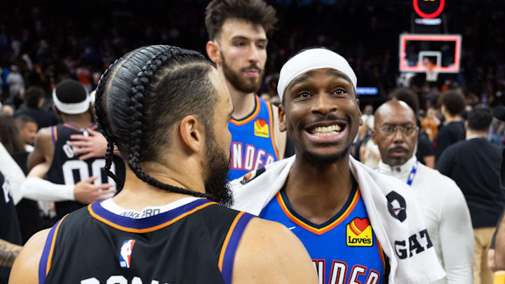 Apr 27, 2026; Phoenix, Arizona, USA; Oklahoma City Thunder guard Shai Gilgeous-Alexander (2) greets Phoenix Suns forward Dillon Brooks (3) after advancing in a four game sweep of the first round of the 2026 NBA Playoffs at Mortgage Matchup Center. Mandatory Credit: Mark J. Rebilas-Imagn Images
