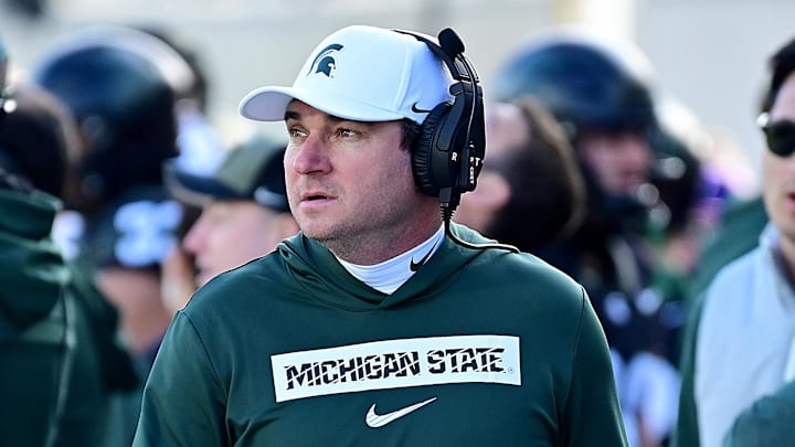 Nov 2, 2024; East Lansing, Michigan, USA; Michigan State Spartans head coach Jonathan Smith looks over his sidelines during the first quarter against the Indiana Hoosiers at Spartan Stadium. Mandatory Credit: Dale Young-Imagn Images Nov 2, 2024; East Lansing, Michigan, USA; Michigan State Spartans head coach Jonathan Smith looks over his sidelines during the first quarter against the Indiana Hoosiers at Spartan Stadium. Mandatory Credit: Dale Young-Imagn Images