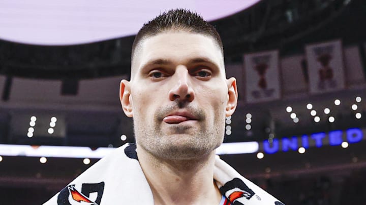 Jan 14, 2026; Chicago, Illinois, USA; Chicago Bulls center Nikola Vucevic (9) smiles as he walks off the court after an NBA game against the Utah Jazz at United Center. Mandatory Credit: Kamil Krzaczynski-Imagn Images