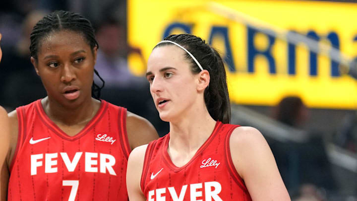 Jun 19, 2025; San Francisco, California, USA; Indiana Fever guard Caitlin Clark (22) talks to guard Lexie Hull (left) and forward Aliyah Boston (7) during the third quarter against the Golden State Valkyries at Chase Center. Mandatory Credit: Darren Yamashita-Imagn Images Jun 19, 2025; San Francisco, California, USA; Indiana Fever guard Caitlin Clark (22) talks to guard Lexie Hull (left) and forward Aliyah Boston (7) during the third quarter against the Golden State Valkyries at Chase Center. Mandatory Credit: Darren Yamashita-Imagn Images