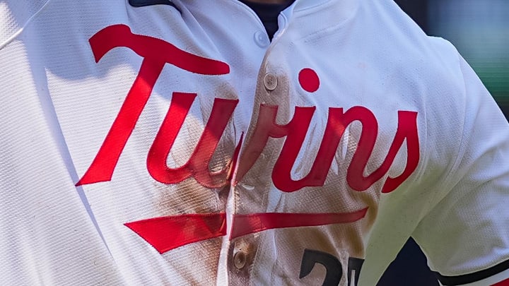 The Minnesota Twins logo on center fielder Byron Buxton's jersey during a July 2025 game