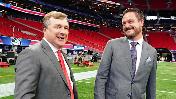 Sep 3, 2022; Atlanta, Georgia, USA; Georgia Bulldogs head coach Kirby Smart greets Oregon Ducks head coach Dan Lanning midfield before the Chick-fil-A kickoff game at Mercedes-Benz Stadium. Mandatory Credit: John David Mercer-Imagn Images Sep 3, 2022; Atlanta, Georgia, USA; Georgia Bulldogs head coach Kirby Smart greets Oregon Ducks head coach Dan Lanning midfield before the Chick-fil-A kickoff game at Mercedes-Benz Stadium. Mandatory Credit: John David Mercer-Imagn Images