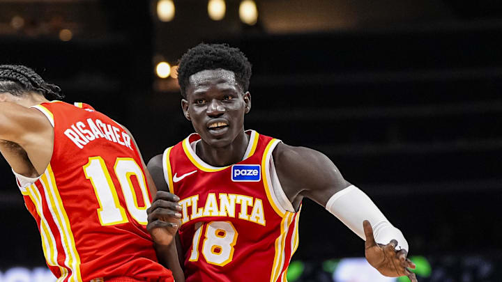 Atlanta Hawks forward Zaccharie Risacher and forward Mouhamed Gueye react after a play against the Los Angeles Lakers during the second half at State Farm Arena Atlanta Hawks forward Zaccharie Risacher and forward Mouhamed Gueye react after a play against the Los Angeles Lakers during the second half at State Farm Arena