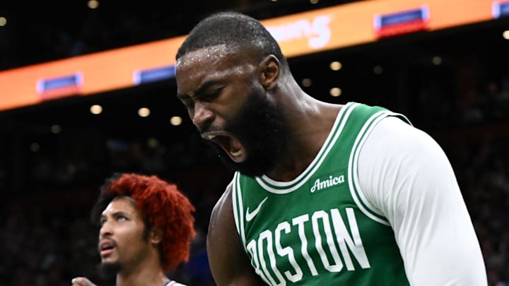 Apr 21, 2026; Boston, Massachusetts, USA; Boston Celtics guard Jaylen Brown (7) reacts after being folded by Philadelphia 76ers guard Kelly Oubre Jr. (9) in the second half of a game two of the first round of the 2026 NBA Playoffs at TD Garden. Mandatory Credit: Brian Fluharty-Imagn Images