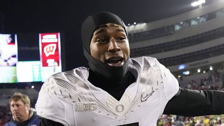Nov 16, 2024; Madison, Wisconsin, USA;  Oregon Ducks wide receiver Evan Stewart (7) greets fans following the game against the Wisconsin Badgers at Camp Randall Stadium. Mandatory Credit: Jeff Hanisch-Imagn Images