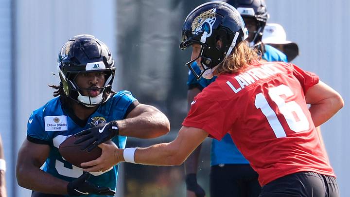 Jacksonville Jaguars quarterback Trevor Lawrence (16) hands off to running back Bhayshul Tuten (33) during the third day of minicamp at the Miller Electric Center, Thursday, June 11, 2026, in Jacksonville, Fla. Jacksonville Jaguars quarterback Trevor Lawrence (16) hands off to running back Bhayshul Tuten (33) during the third day of minicamp at the Miller Electric Center, Thursday, June 11, 2026, in Jacksonville, Fla.