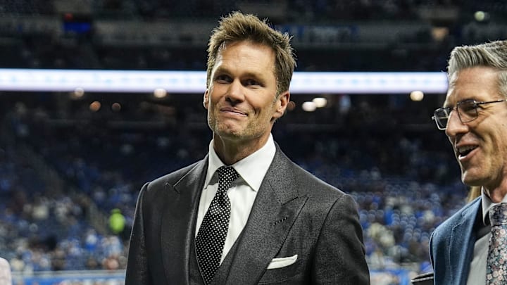 Tom Brady acknowledges fans as he walks into the tunnel before the NFC divisional round between Detroit Lions and Washington Commanders at Ford Field in Detroit on Saturday, Jan. 18, 2025.