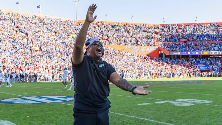 Florida Gators associate head coach for running backs Jabbar Juluke celebrates after a game against the Mississippi Rebels Florida Gators associate head coach for running backs Jabbar Juluke celebrates after a game against the Mississippi Rebels