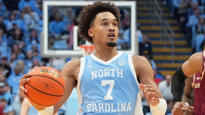 Dec 30, 2025; Chapel Hill, North Carolina, USA; North Carolina Tar Heels guard Seth Trimble (7) on the fast break as Florida State Seminoles guard Martin Somerville (1) defends in the second half at Dean E. Smith Center. Mandatory Credit: Bob Donnan-Imagn Images Dec 30, 2025; Chapel Hill, North Carolina, USA; North Carolina Tar Heels guard Seth Trimble (7) on the fast break as Florida State Seminoles guard Martin Somerville (1) defends in the second half at Dean E. Smith Center. Mandatory Credit: Bob Donnan-Imagn Images