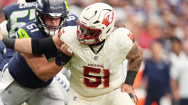 Arizona Cardinals defensive lineman Roy Lopez (51) closes in on Seattle Seahawks running back Jadarian Price (8) at State Farm Stadium in Glendale on Sept. 20, 2026.