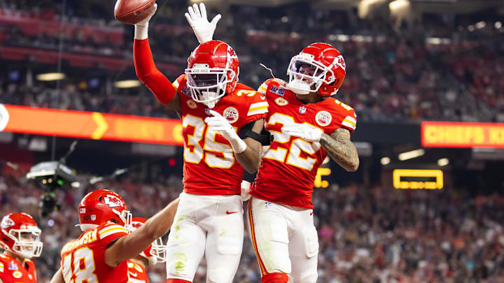 Feb 11, 2024; Paradise, Nevada, USA; Kansas City Chiefs cornerback Jaylen Watson (35) celebrates with Trent McDuffie (22) after recovering a muffed punt against the San Francisco 49ers in the second half in Super Bowl LVIII at Allegiant Stadium. Mandatory Credit: Mark J. Rebilas-Imagn Images