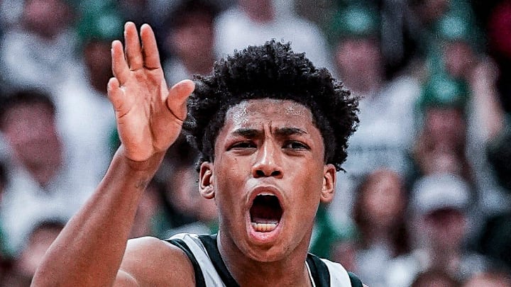Michigan State guard Jeremy Fears Jr. (1) looks to pass the ball ]against Indiana forward Trent Sisley (11) during the second half at Breslin Center in East Lansing on Tuesday, Jan. 13, 2026.
