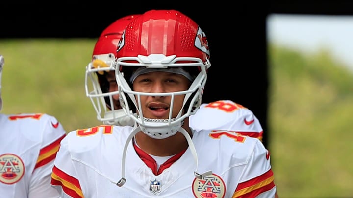 Kansas City Chiefs quarterbacks Patrick Mahomes (15) leads Carson Wentz (11) and Ian Book (2) before a preseason NFL football game Saturday, Aug. 10, 2024 at EverBank Stadium in Jacksonville, Fla. The Jacksonville Jaguars defeated the Kansas City Chiefs 26-13. [Corey Perrine/Florida Times-Union]