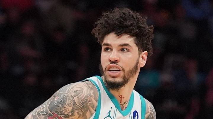 LaMelo Ball moves the ball during the second half during the play-in rounds between the Charlotte Hornets and the Miami Heat.