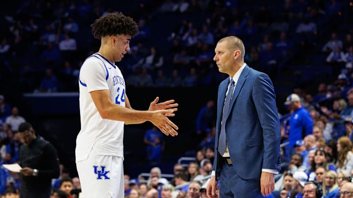 Nov 4, 2025; Lexington, Kentucky, USA; Kentucky Wildcats center Malachi Moreno (24) talks with head coach Mark Pope during the second half against the Nicholls Colonels at Rupp Arena at Central Bank Center. Mandatory Credit: Jordan Prather-Imagn Images Nov 4, 2025; Lexington, Kentucky, USA; Kentucky Wildcats center Malachi Moreno (24) talks with head coach Mark Pope during the second half against the Nicholls Colonels at Rupp Arena at Central Bank Center. Mandatory Credit: Jordan Prather-Imagn Images