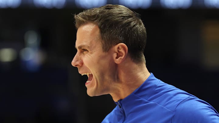 Feb 10, 2026; Pittsburgh, Pennsylvania, USA;  Duke Blue Devils head coach Jon Scheyer reacts on the court against the Pittsburgh Panthers during the first half at Petersen Events Center. Mandatory Credit: Charles LeClaire-Imagn Images