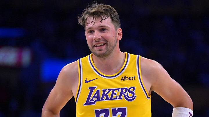 Oct 8, 2026; Los Angeles, California, USA;  Los Angeles Lakers guard Luka Doncic (77) smiles at the free throw line during the second half against the Sacramento Kings at Crypto.com Arena. Mandatory Credit: Jayne Kamin-Oncea-Imagn Images