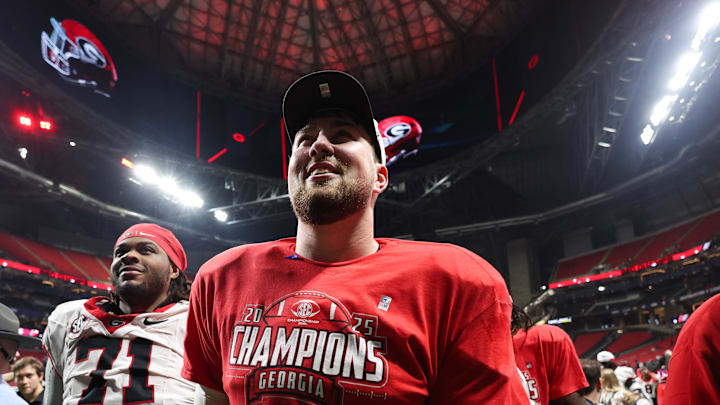 Georgia Bulldogs offensive lineman Monroe Freeling (57) celebrates