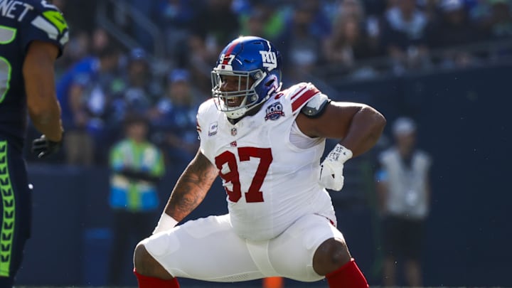 Oct 6, 2024; Seattle, Washington, USA; New York Giants defensive tackle Dexter Lawrence II (97) celebrates following a sack against the Seattle Seahawks during the second quarter at Lumen Field. Mandatory Credit: Joe Nicholson-Imagn Images