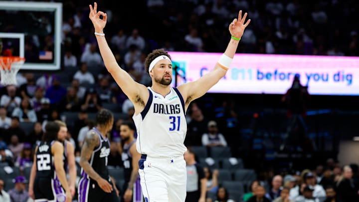 Apr 16, 2025; Sacramento, California, USA; Dallas Mavericks guard Klay Thompson (31) celebrates after scoring a basket during the fourth quarter against the Sacramento Kings at Golden 1 Center. Mandatory Credit: Sergio Estrada-Imagn Images