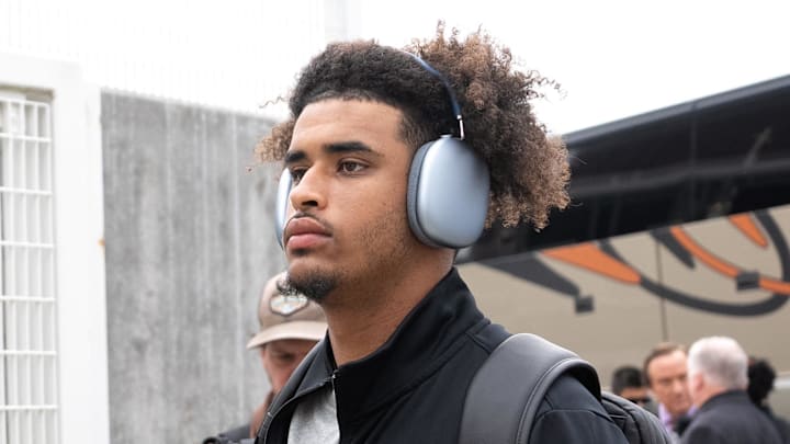 dante moore name image and likeness NIL oregon ducks big ten football dan lanning beats by dre deal evan stewart isaiah world