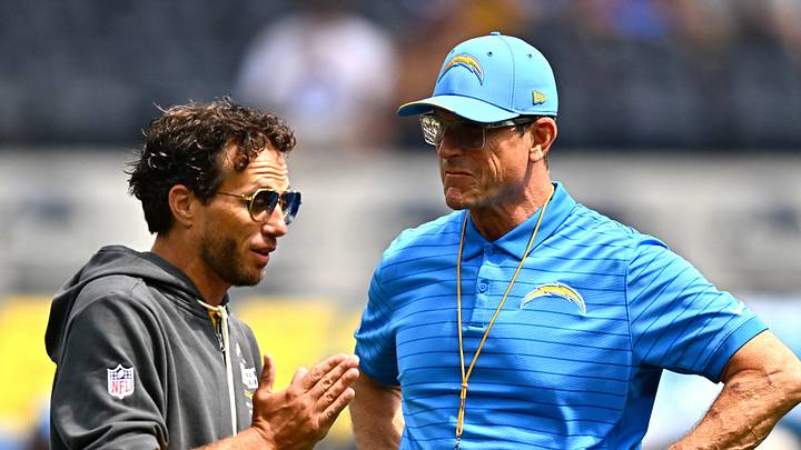 Los Angeles Chargers head coach Jim Harbaugh (right) with offensive coordinator Mike McDaniel (left) Los Angeles Chargers head coach Jim Harbaugh (right) with offensive coordinator Mike McDaniel (left)