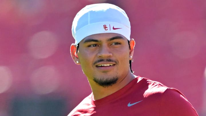 Oct 11, 2025; Los Angeles, California, USA;  USC Trojans quarterback Jayden Maiava (14) warms up prior to the game against the Michigan Wolverines at United Airlines Field at the Los Angeles Memorial Coliseum. Mandatory Credit: Jayne Kamin-Oncea-Imagn Images