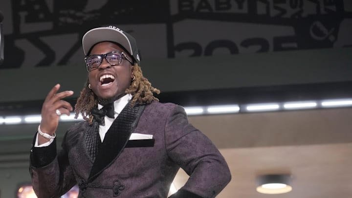 Boise State Broncos running back Ashton Jeanty poses after being selected by the Las Vegas Raiders as the number six pick in the first round of the 2025 NFL Draft at Lambeau Field. Boise State Broncos running back Ashton Jeanty poses after being selected by the Las Vegas Raiders as the number six pick in the first round of the 2025 NFL Draft at Lambeau Field.