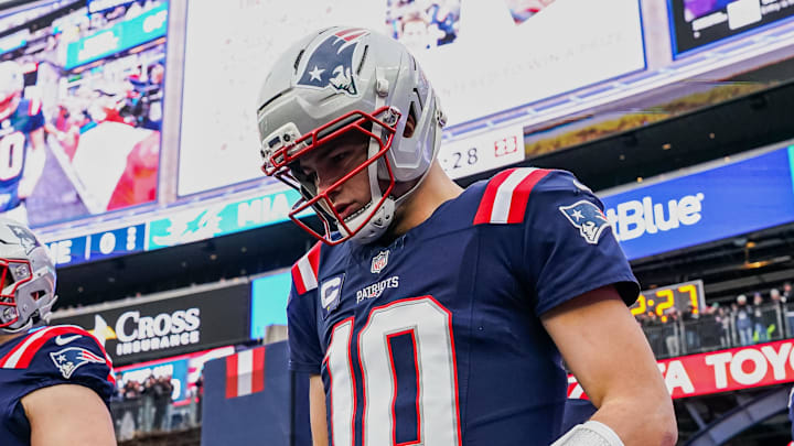 Jan 4, 2026; Foxborough, Massachusetts, USA; New England Patriots quarterback Drake Maye (10) and defensive tackle Eric Gregory (55) walk out of the player tunnel before the game against the Miami Dolphins at Gillette Stadium. Mandatory Credit: David Butler II-Imagn Images