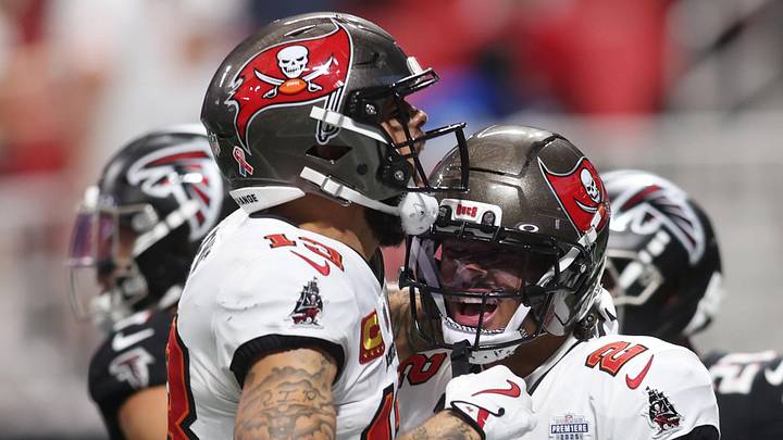 Tampa Bay Buccaneers wide receiver Mike Evans (13) celebrates with wide receiver Emeka Egbuka (2) after a touchdown