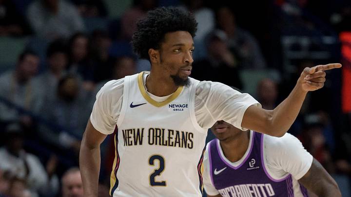 Feb 9, 2026; New Orleans, Louisiana, USA; New Orleans Pelicans forward Herbert Jones (2) reacts after a basket against Sacramento Kings guard Daeqwon Plowden (29) during the first half at Smoothie King Center. Mandatory Credit: Matthew Hinton-Imagn Images
