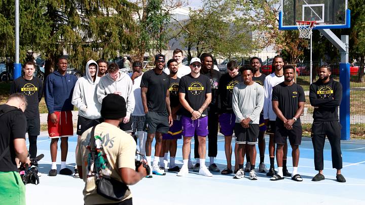 Basketball - NBA - Los Angeles Lakers visit to Ljubljana - Ljubljana, Slovenia - August 23, 2026 Los Angeles Lakers' Luka Doncic poses for a photo with teammates on the court where he played growing up in Ljubljana REUTERS/Borut Zivulovic Basketball - NBA - Los Angeles Lakers visit to Ljubljana - Ljubljana, Slovenia - August 23, 2026 Los Angeles Lakers' Luka Doncic poses for a photo with teammates on the court where he played growing up in Ljubljana REUTERS/Borut Zivulovic