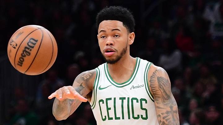 Feb 1, 2026; Boston, Massachusetts, USA; Boston Celtics guard Anfernee Simons (4) passes the ball during the second half against the Milwaukee Bucks at TD Garden. Mandatory Credit: Bob DeChiara-Imagn Images
