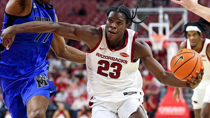 Arkansas Razorbacks guard Jordan Smith Jr (23) drives in the lane during the second half against the Memphis Tigers at Bud Walton Arena. Arkansas Razorbacks guard Jordan Smith Jr (23) drives in the lane during the second half against the Memphis Tigers at Bud Walton Arena.