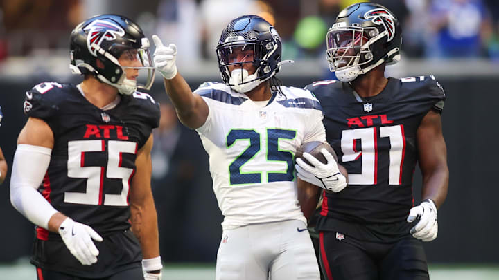 Oct 20, 2024; Atlanta, Georgia, USA; Seattle Seahawks running back Kenny McIntosh (25) reacts after a first down against the Atlanta Falcons in the fourth quarter at Mercedes-Benz Stadium. Mandatory Credit: Brett Davis-Imagn Images
