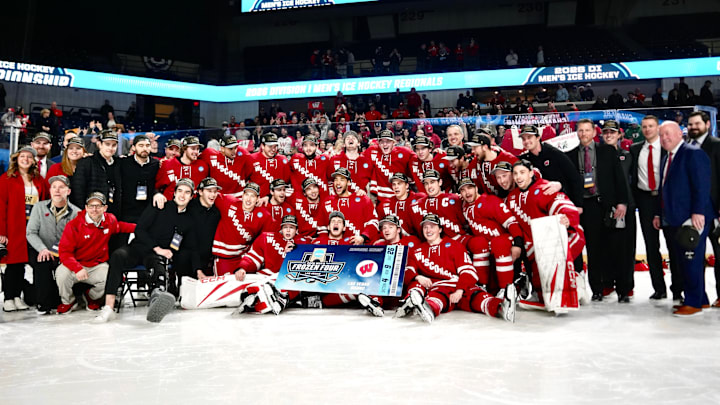 Wisconsin hockey celebrates defeating Michigan State in overtime 4-3 to advance to the 2026 Frozen Four. Wisconsin hockey celebrates defeating Michigan State in overtime 4-3 to advance to the 2026 Frozen Four.