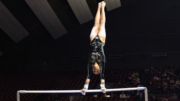 Jan 23, 2026; Tuscaloosa, Alabama, USA; Missouri gymnast Kimarra Echols performs her bar routine during a meet against No. 3 Alabama. 