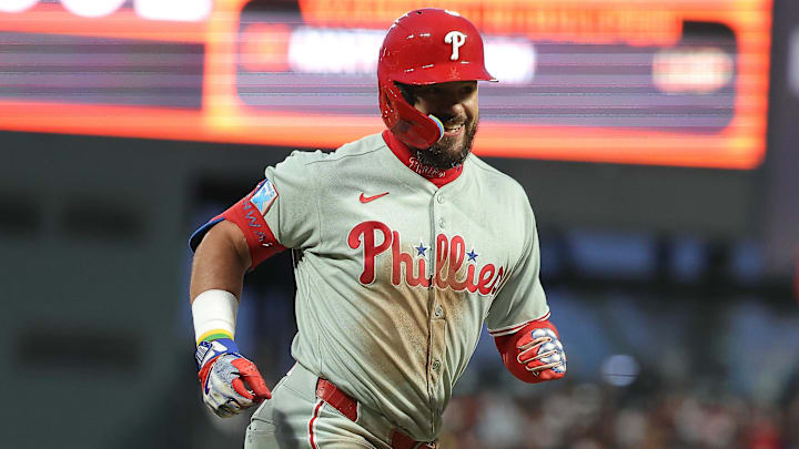 Jul 8, 2025; San Francisco, California, USA; Philadelphia Phillies designated hitter Kyle Schwarber (12) smiles as he runs home on a two-run home run against the San Francisco Giants during the seventh inning at Oracle Park