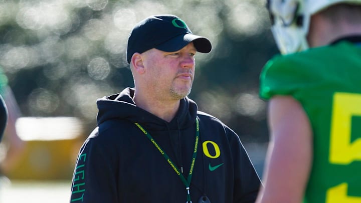 Oregon Special Teams Coordinator Joe Lorig, center, during the first practice of the 2022 season.

Eug 0310222 Uo Football 13