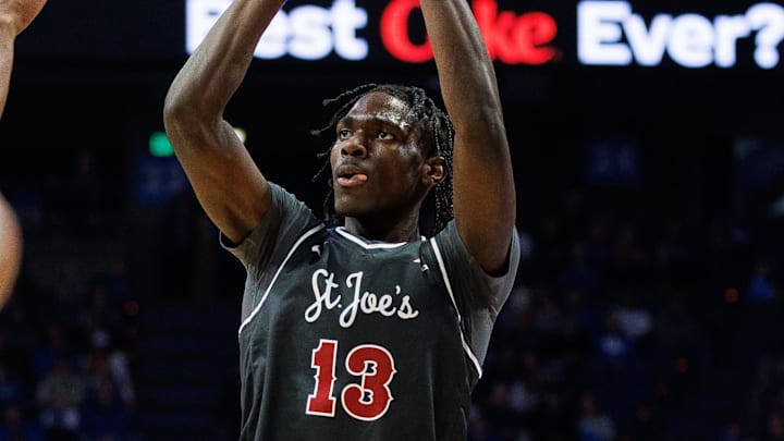 Nov 20, 2023; Lexington, Kentucky, USA; Saint Joseph's Hawks forward Rasheer Fleming (13) shoots the ball during the first half against the Kentucky Wildcats at Rupp Arena at Central Bank Center. Mandatory Credit: Jordan Prather-Imagn Images