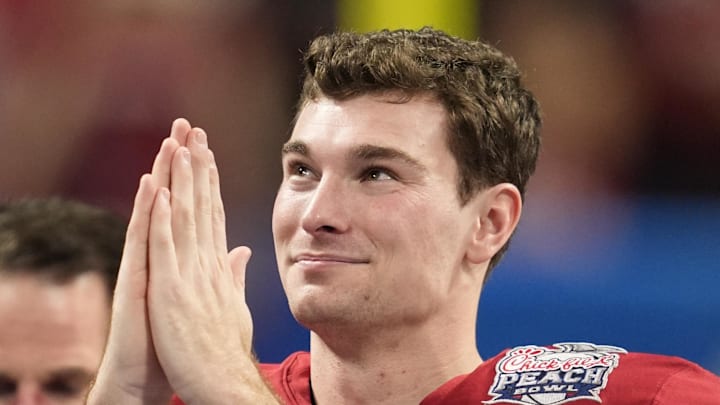 Jan 9, 2026; Atlanta, GA, USA; Indiana Hoosiers quarterback Fernando Mendoza (15) reacts after the 2025 Peach Bowl and semifinal game of the College Football Playoff at Mercedes-Benz Stadium. Mandatory Credit: Dale Zanine-Imagn Images