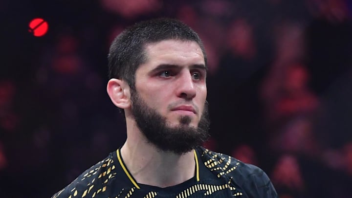 Jan 18, 2025; Inglewood, California, USA; Islam Makhachev (red gloves) reacts after defeating Renato Moicano (not pictured) in a lightweight title fight during UFC 311 at Intuit Dome. Mandatory Credit: Gary A. Vasquez-Imagn Images
