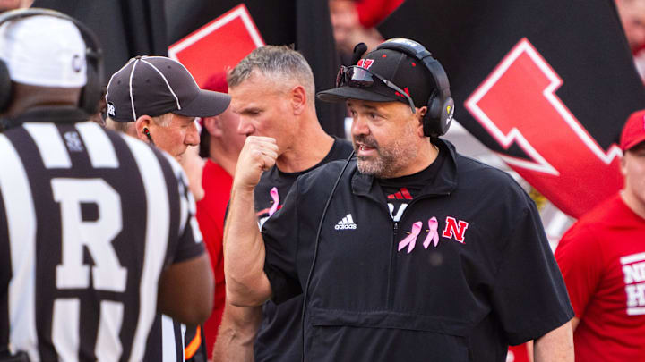 Oct 5, 2024; Lincoln, Nebraska, USA; Nebraska Cornhuskers head coach Matt Rhule talks with officials during a review in the second quarter against the Rutgers Scarlet Knights at Memorial Stadium. Oct 5, 2024; Lincoln, Nebraska, USA; Nebraska Cornhuskers head coach Matt Rhule talks with officials during a review in the second quarter against the Rutgers Scarlet Knights at Memorial Stadium.
