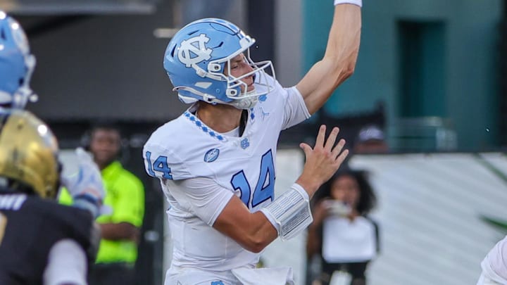 Sep 20, 2025; Orlando, Florida, USA; North Carolina Tar Heels quarterback Max Johnson (14) throws a pass during the second half against the UCF Knights at the Bounce House Stadium. Mandatory Credit: Mike Watters-Imagn Images Sep 20, 2025; Orlando, Florida, USA; North Carolina Tar Heels quarterback Max Johnson (14) throws a pass during the second half against the UCF Knights at the Bounce House Stadium. Mandatory Credit: Mike Watters-Imagn Images