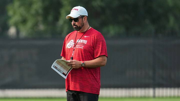 Ohio State Buckeyes head coach Ryan Day watches during the first practice of training camp at the Woody Hayes Athletic Center in Columbus on Aug. 6, 2026. Ohio State Buckeyes head coach Ryan Day watches during the first practice of training camp at the Woody Hayes Athletic Center in Columbus on Aug. 6, 2026.